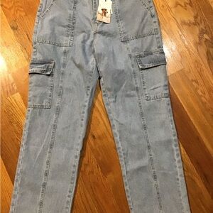 Woman’s new with tags size 9 Light Blue Cargo Jeans